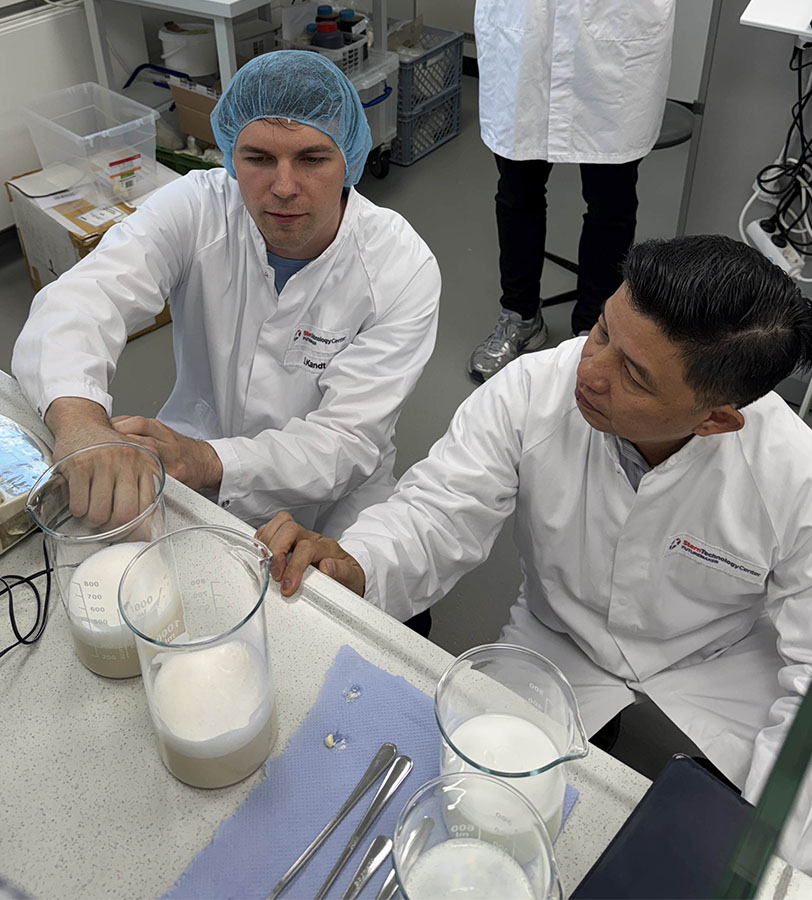 Sternchemie technologists analysing lecithin Two Sternchemie technologists analysing lecithin in labatory.